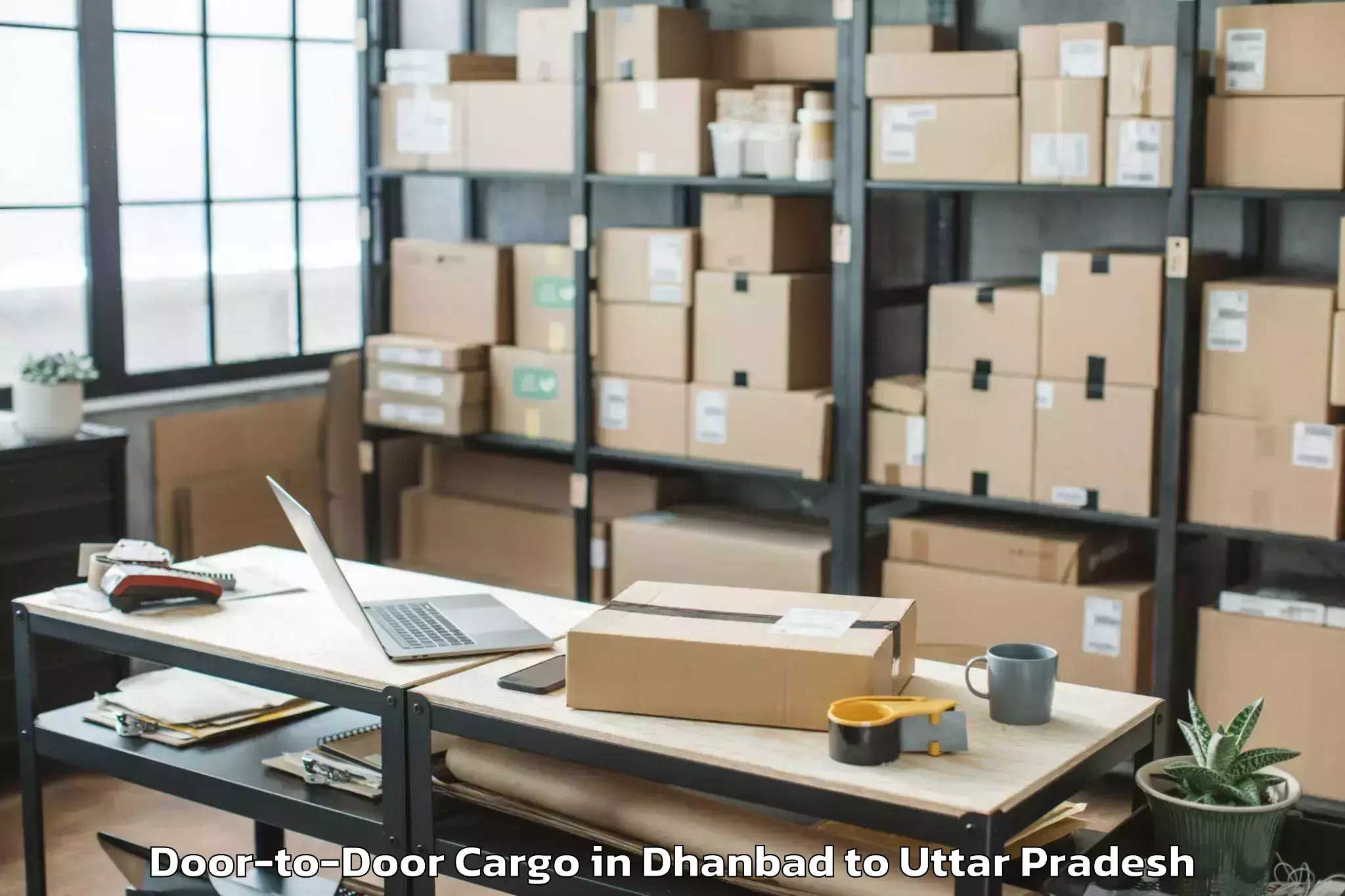 Book Dhanbad to Mahgawan Door To Door Cargo Online